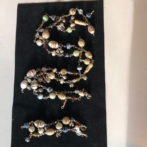 Whimsical beaded necklace 40” and bracelet 8”.